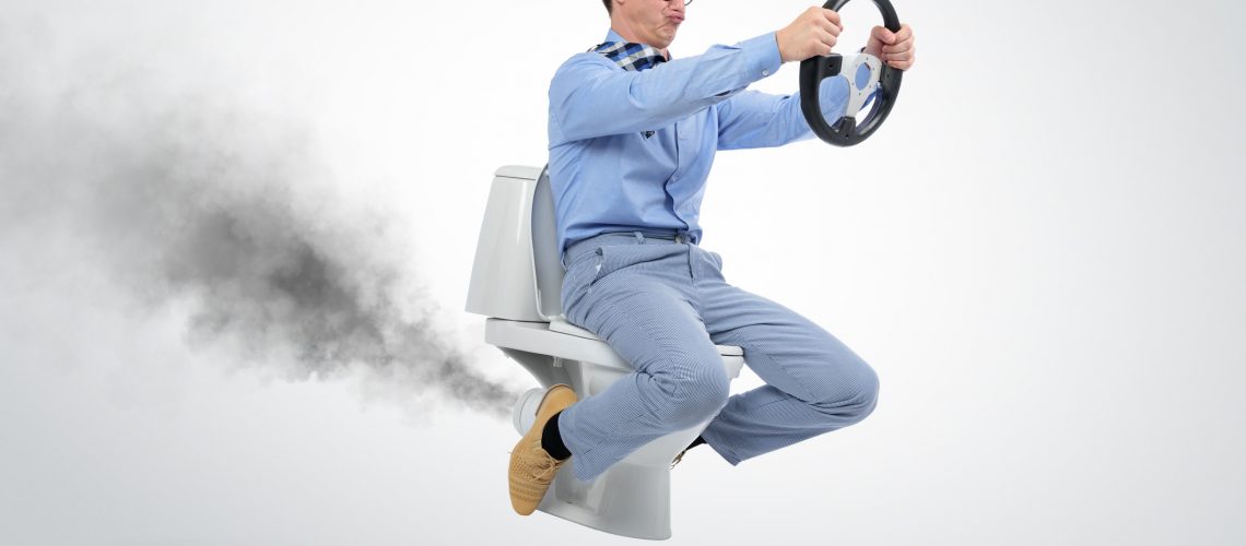 man on toilet with a wheel